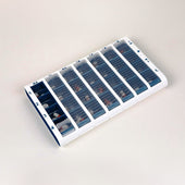 Blue Pivotell large pill organiser with seven daily sections, each with four slots, shown from above.