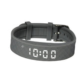 Pivotell Vibratime Red watch at 10:00 with textured silicone strap and vibrating medication reminder, front view.