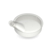 White plastic spouted lid with small opening and ventilation hole for coffee cups, top view.