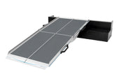 Multi-folding ramp positioned at stair edge, side view.
