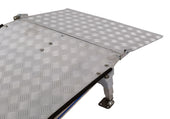 Permaramp-Entry Flap by Enable Access showing diamond plate surface and single-sided supporting legs, close-up view.