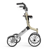 Beige Trust Care Let’s Go Out rollator with large wheels, ergonomic handles and lightweight frame, side view.