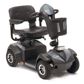 Red Drive Envoy 4 mobility scooter with padded seat, armrests, front basket and large tyres, side view.