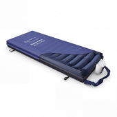 Dyna-Form Air Pro-Plus Dynamic Mattress System with internal air cells and control pump, high-angle view.