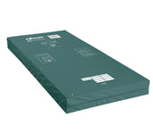 Green rectangular Sidhil MAT 30 mattress with white labels and logos, designed for high-risk pressure ulcers, shown top view.