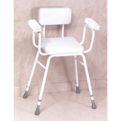 NRS Malvern perching stool with arms and backrest on a tiled bathroom floor, angled front view.