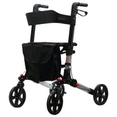 Grey fold flat rollator with four wheels, storage bag at the front, and ergonomic handles with easy brakes, side view.