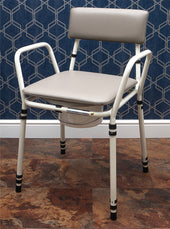 Brown height adjustable commode with armrests and removable bucket on tiled floor, blue geometric wall in background, front angle.