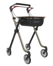 White and black Rehasense Space I Indoor Rollator with four wheels, adjustable handles and storage compartment, side view.