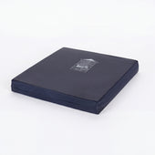 Navy blue rectangular high density foam seat cushion for pressure relief, top angle view.