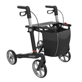 Black carbon fibre rollator with ergonomic handles and front storage bag, lightweight design, side view.