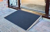 3 inch Doorline-Threshold Wedge for bridging outdoor brick and indoor carpet, all-weather grip surface, shown in side view.