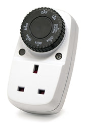 White plug-in timer switch with rotary dial and single socket, shown for home use, front angle.