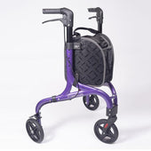 Purple NRS Freestyle 3 wheel rollator with black storage bag, white background, front angle.