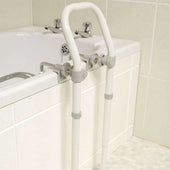 White bath rail attached to edge of bathtub, designed to assist with getting in and out, side view.
