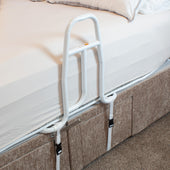 NRS Easyfit Bed Rail with Strap for support getting in and out of bed, shown attached to bed frame, side view.