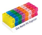 Aidapt monthly pill organiser with colour-coded AM and PM sections for each day, arranged by week, top view.