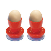 White Aidapt suction egg cups holding two eggs, side by side on a white background, front view.