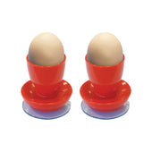 White Aidapt suction egg cups holding two eggs, side by side on a white background, front view.