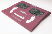 Invacare Softform Heelpad showing two foot outlines and black pockets for heel support, top view.