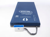 Blue Invacare Softform Premier Active 2 Hybrid Mattress with control unit and cable for pressure relief, white background, front angle.