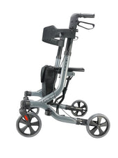 Dark grey lightweight aluminium 4 wheel rollator with brake handle and black seat, side view on white.