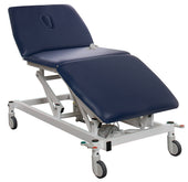 Apple green three-section bariatric plinth with height adjustment and wheels, side view.