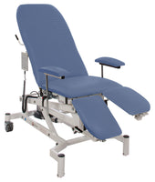 Midnight Black Sidhil Doherty treatment chair with armrests, leg support, control panel and wheels, adjustable height, front view.