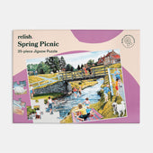 Relish 35 piece jigsaw puzzle with large pieces, people and dogs at a spring picnic by a stream in a park, front view.