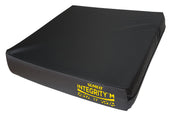 Black Sumed Integrity Static Cushion with yellow branding, medium risk support for pressure sores, front angle.