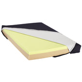 Drive Lullaby VE cot mattress with cover partly unzipped, revealing yellow and light green foam layers inside, close-up.
