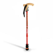 Orange Flexyfoot telescopic walking stick with cork handle standing upright, white background, front view.