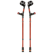 Pair of pink double adjustable crutches with black arm cuffs, standing upright, white background, front view.