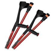 Red carbon fibre folding crutches with soft ergonomic handles and shock-absorbing tips, front view.