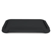 Red rectangular large non-slip cutting board with raised edges on a white background, low front view.