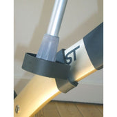 Trust Care crutch holder attached to Lets Go Out Rollator, holding a walking stick with a black clamp bracket, close-up.