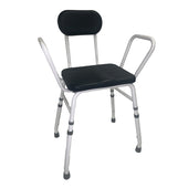 Height-adjustable white perching stool with black seat, backrest, and armrests, side view.