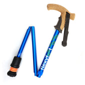 Orange folding walking stick with cork handle, black strap, and Flexyfoot ferrule, side view.