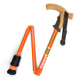 Orange folding walking stick with cork handle, Flexyfoot ferrule, rubber tip and black wrist strap, side view.