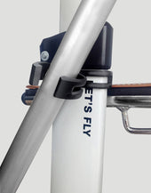 Able2 Crutch Holder attached to Lets Fly Rollator with black clamps, partial LETS FLY text visible, close-up view.