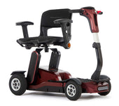 Sand-coloured Connex folding scooter with padded seat, armrests, and tiller steering on white background, side view.
