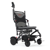 Black carbon fibre powerchair with cushioned seat, joystick and sturdy wheels, shown from a side angle.