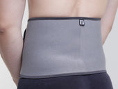 Kedley Pro-Light Neoprene Back Support worn around the waist, shown in use, rear view.