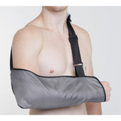 Person wearing Kedley fabric arm pouch, left arm supported, plain background, in use front view.