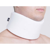 Person wearing a Kedley neck collar for support, covering from lower jaw to upper chest, front view.
