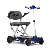 Red aluminium manual scooter with grey seat, black armrests and puncture-proof tyres, compact design, side view.