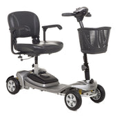 Motion Healthcare Alumina mobility scooter with four wheels, aluminium frame, black cushioned seat, armrests and front basket, side view.
