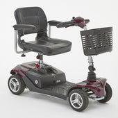 Plum Motion Healthcare Airium 4-wheel scooter with black seat, armrests and front basket, side view.