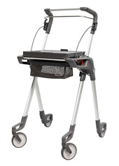 Turquoise Topro Hestia indoor rollator with four wheels, mesh basket, tray and adjustable handrail, side view.