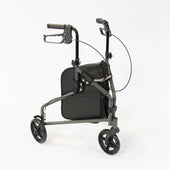 Silver three wheel steel rollator with height-adjustable handles, brakes and a storage pouch on white background, front angle.